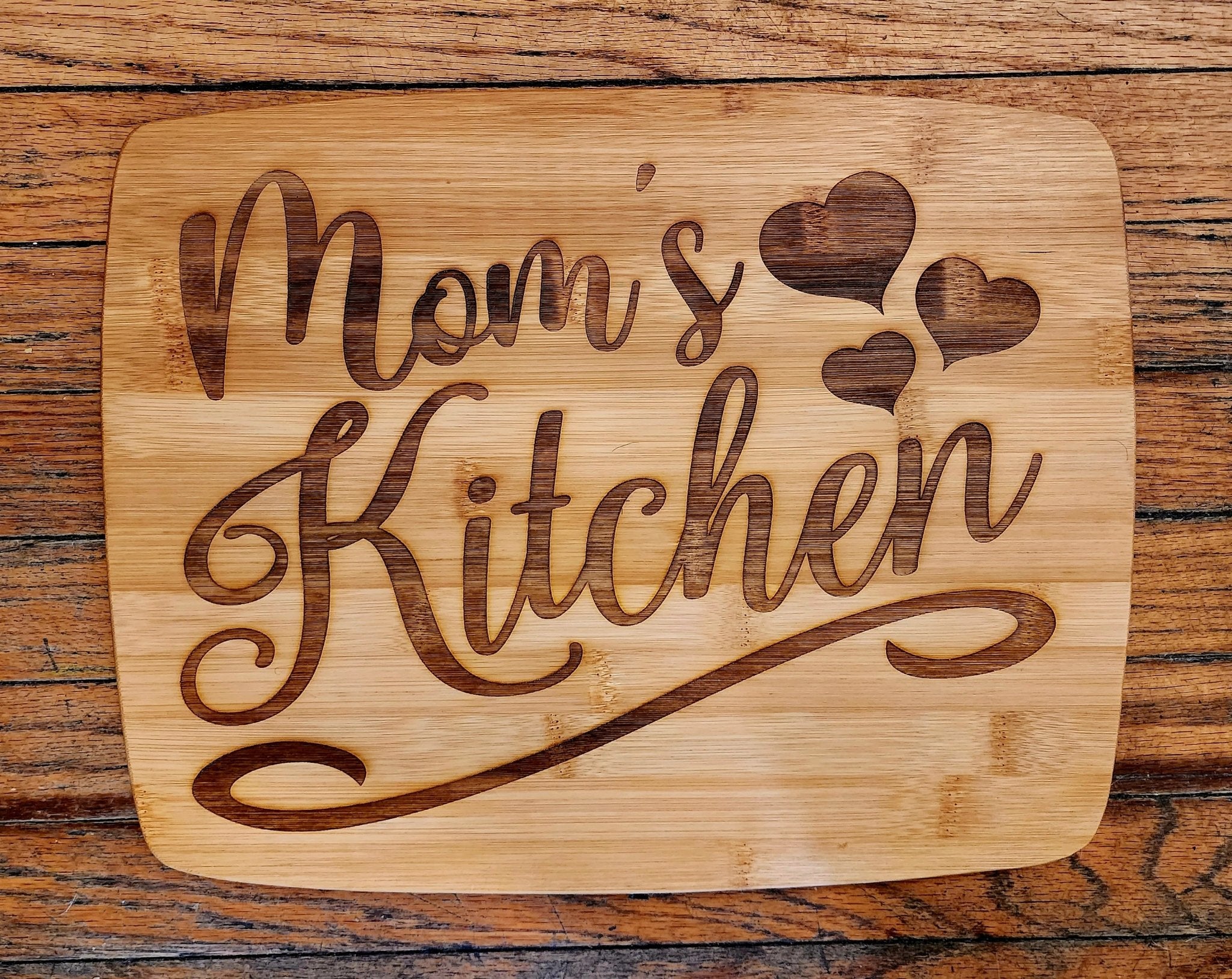 https://fairywolfcreations.com/cdn/shop/products/custom-cutting-board-laser-engraved-bamboo-cutting-board-gift-mothers-day-fathers-day-326412.jpg?v=1698274482&width=2048